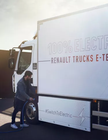 Man charging Renault Trucks E-Tech D